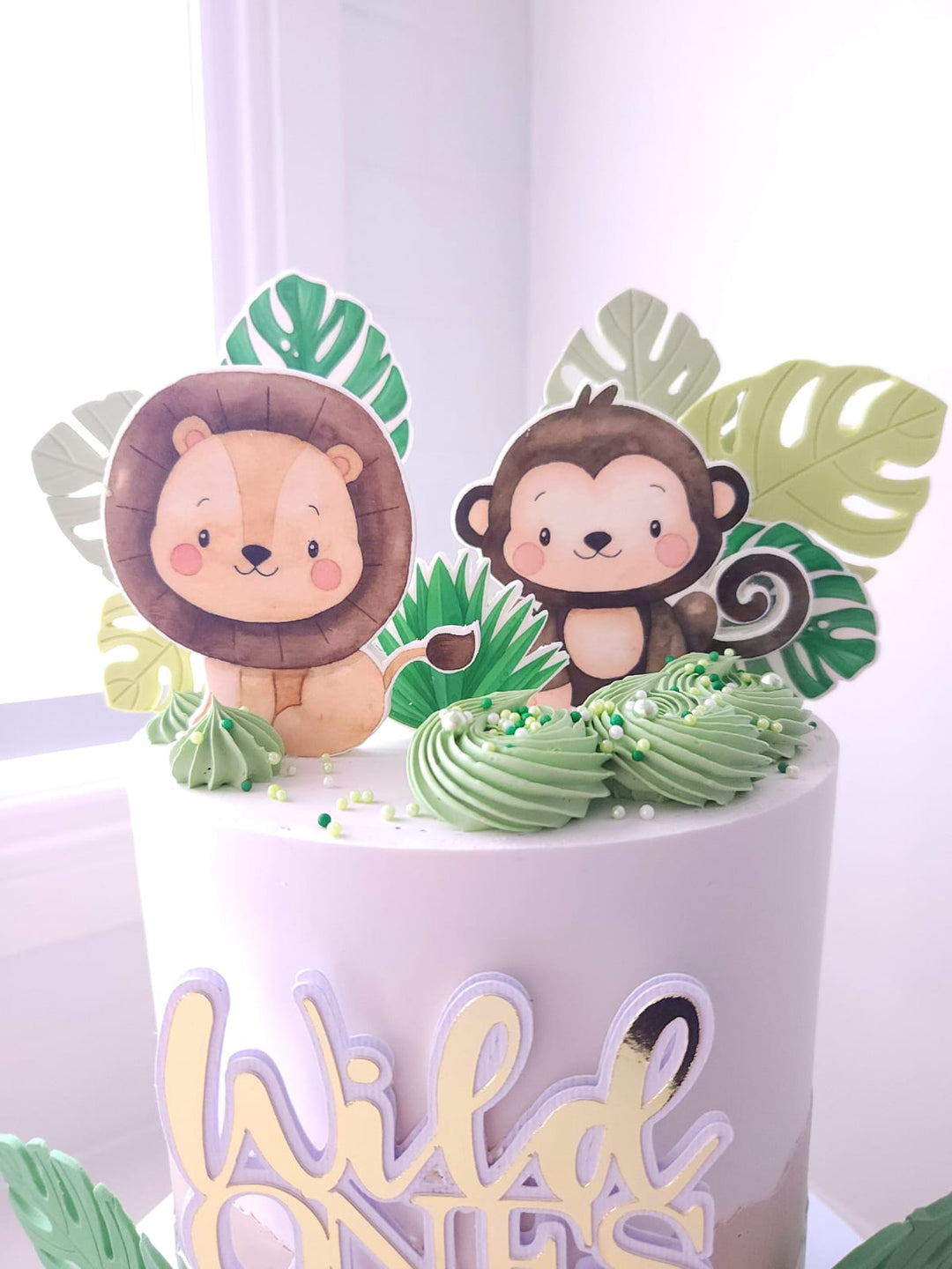 Sweet Safari cake styled for a jungle themed celebration