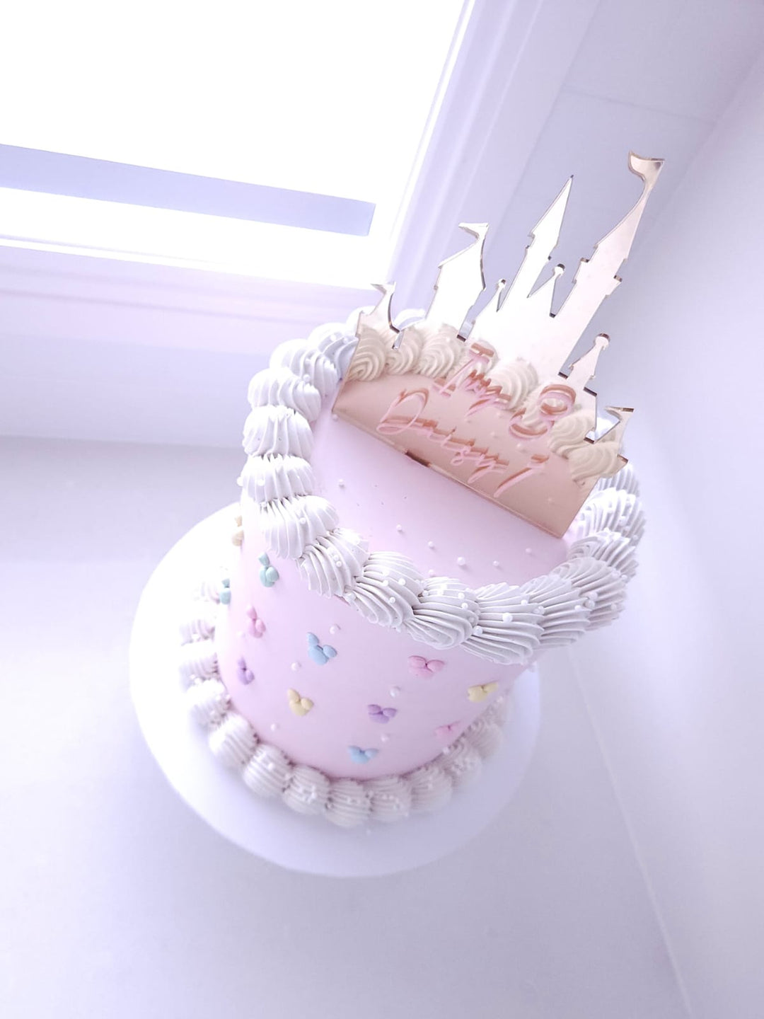 Once Upon a Castle cake styled for a fairytale birthday celebration