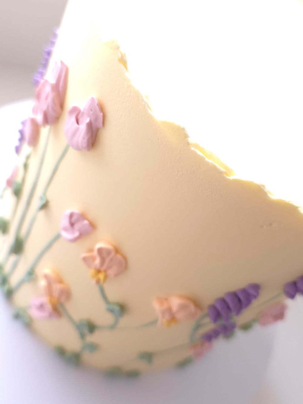 Side view of Floral Bloom celebration cake