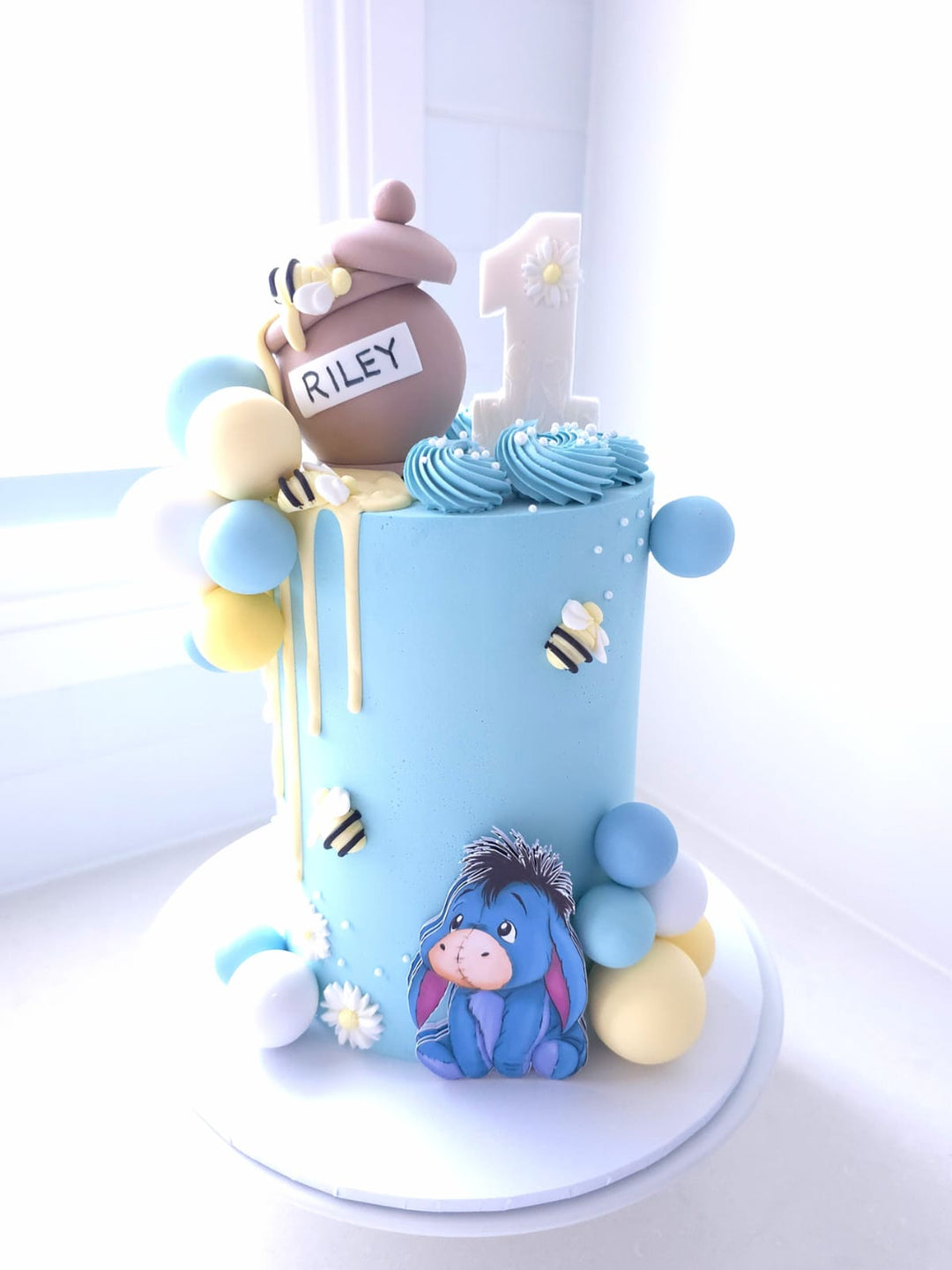 Sweet As Can Bee blue buttercream first birthday cake with fondant honey pot, bees and baubles