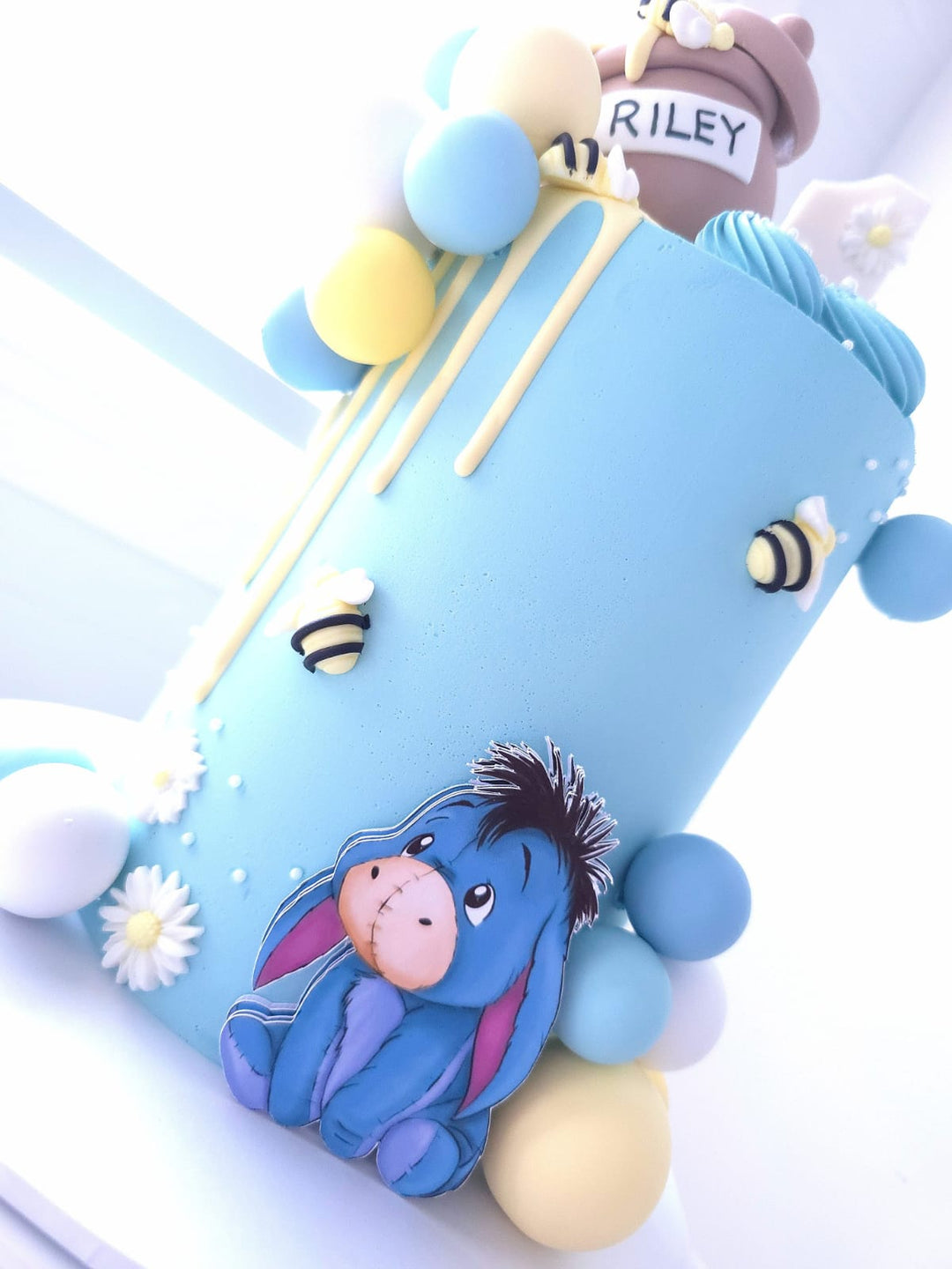 Sweet As Can Bee cake styled for a first birthday celebration