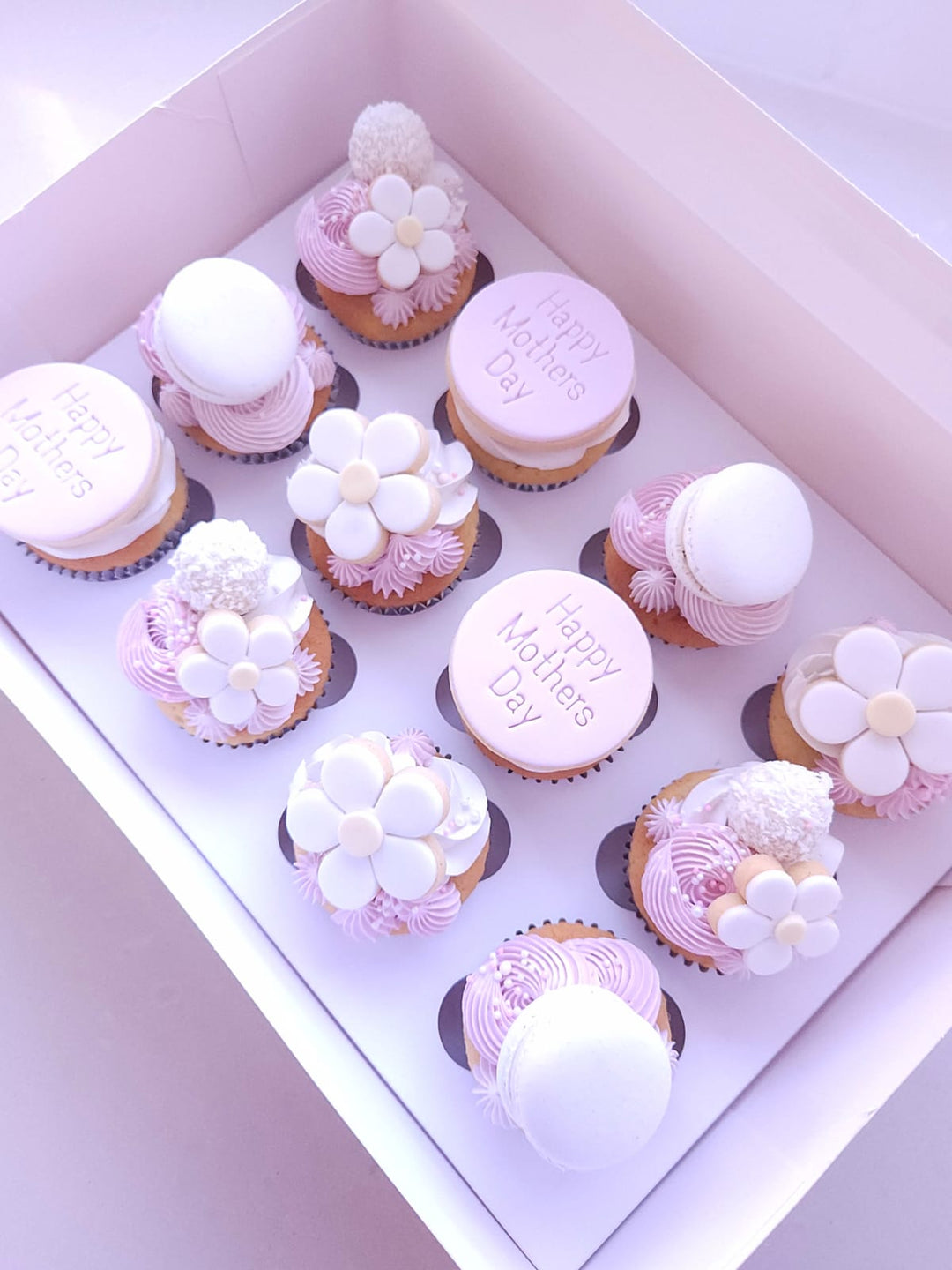 Sweet As A Daisy Mother's Day cupcakes with soft pink buttercream swirls and daisy-inspired details