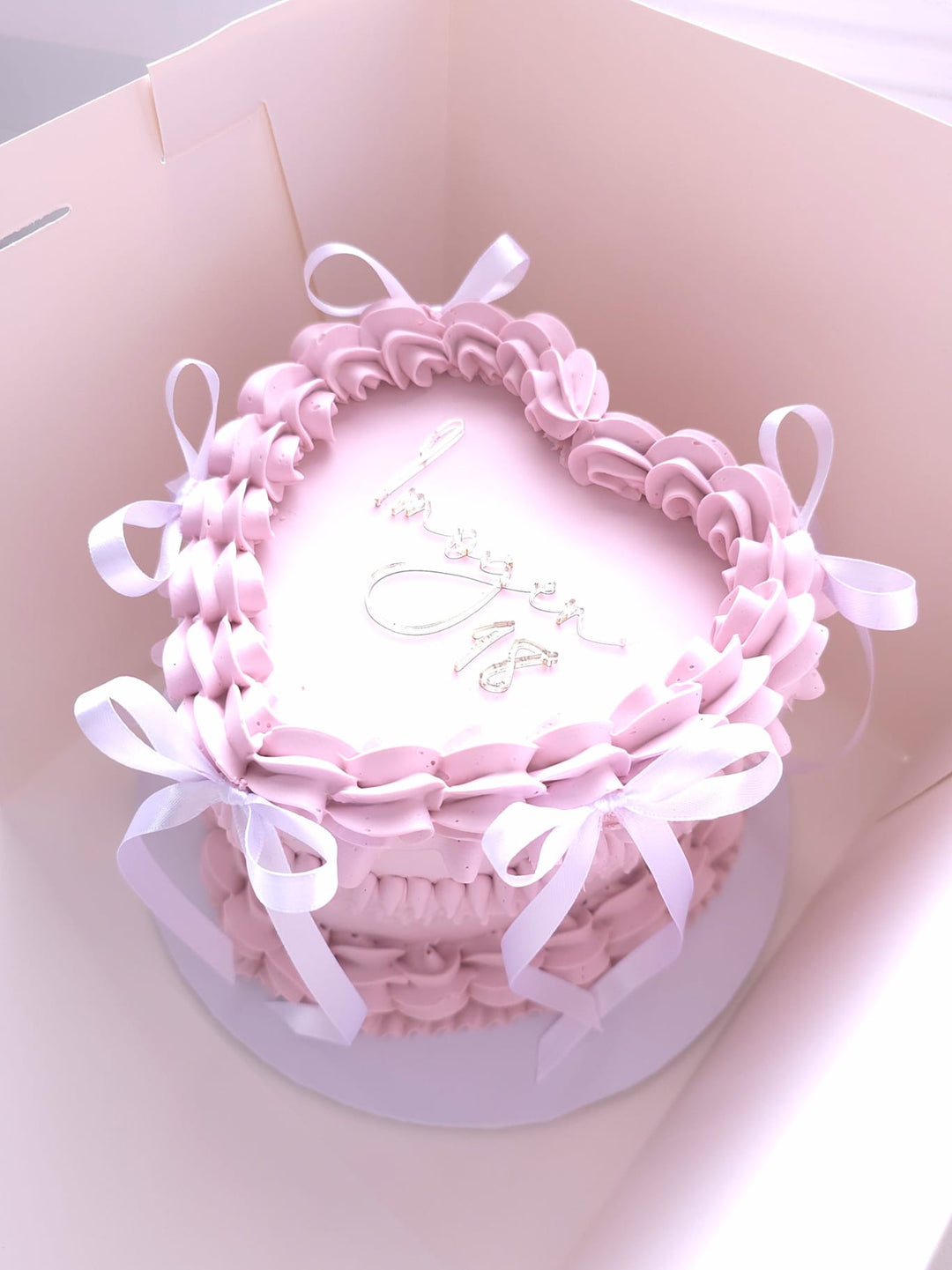 Lambeth Heart Cake displayed on a cake stand