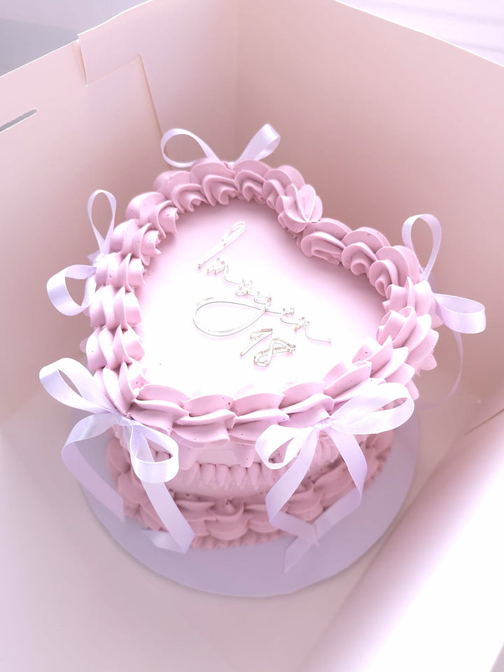 Lambeth Heart Cake displayed on a cake stand